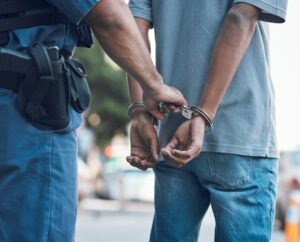 A person is being arrested. An Ohio criminal defense lawyer can help you explore whether you can remove a criminal charge from your record.